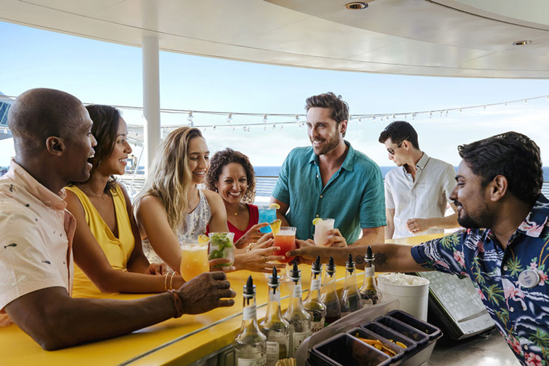 Photo of happy adults at a bar